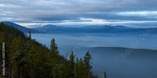 Foggy mountains in the morning. Panoramic view from Green Ridge Lookout in Central Oregon.