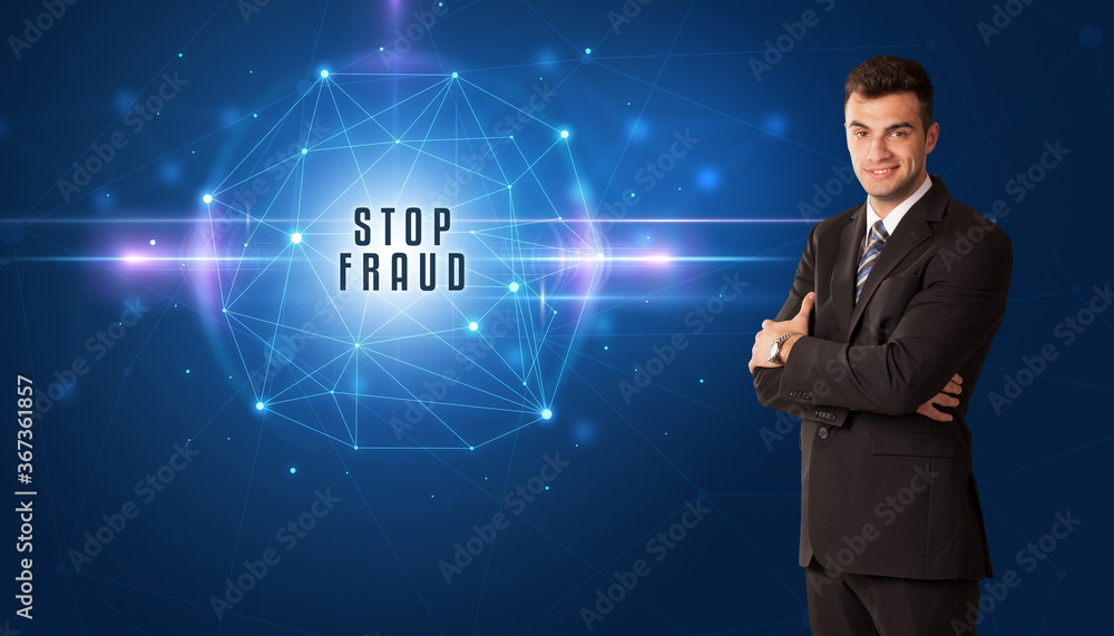 Businessman thinking about security solutions with STOP FRAUD inscription Businessman thinking about security solutions with STOP FRAUD inscription