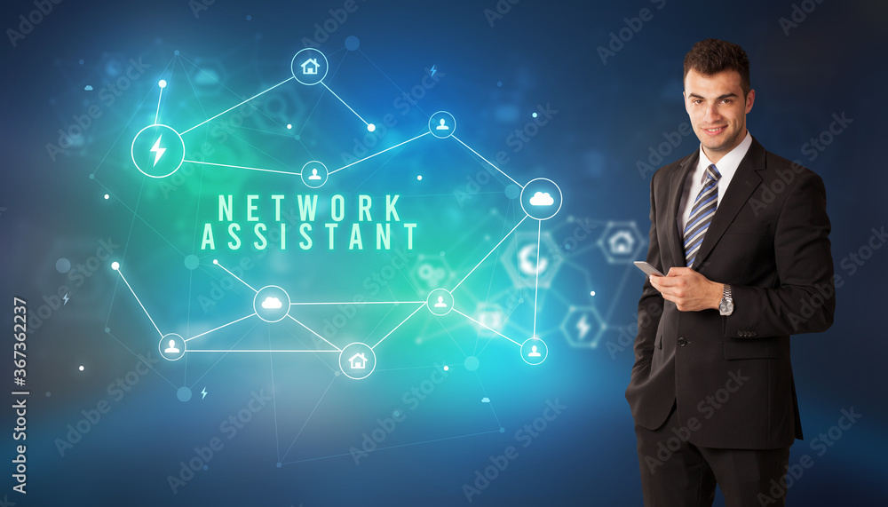 Businessman in front of cloud service icons with NETWORK ASSISTANT inscription, modern technology concept Businessman in front of cloud service icons with NETWORK ASSISTANT inscription, modern technology concept
