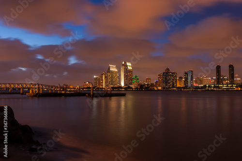 San Diego Skyline  at Sunset Across San Diego Bay From Tidelands Park on Coronado Island San Diego California USA