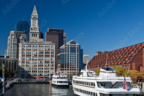 Boston Harbor Cruise Ships at Long Wharf With The Custom House Tower In The Distance, Boston, Massachusetts, USA