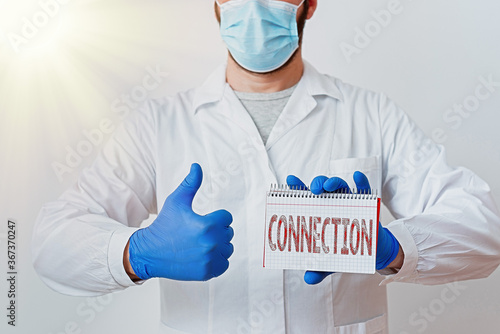 Conceptual hand writing showing Connection. Concept meaning relationship in which an individual, thing is linked to something else Laboratory Technician Featuring Sticker Paper Smartphone photo