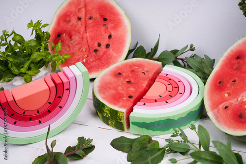 Watermelon made from natural material. Wooden watermelon.