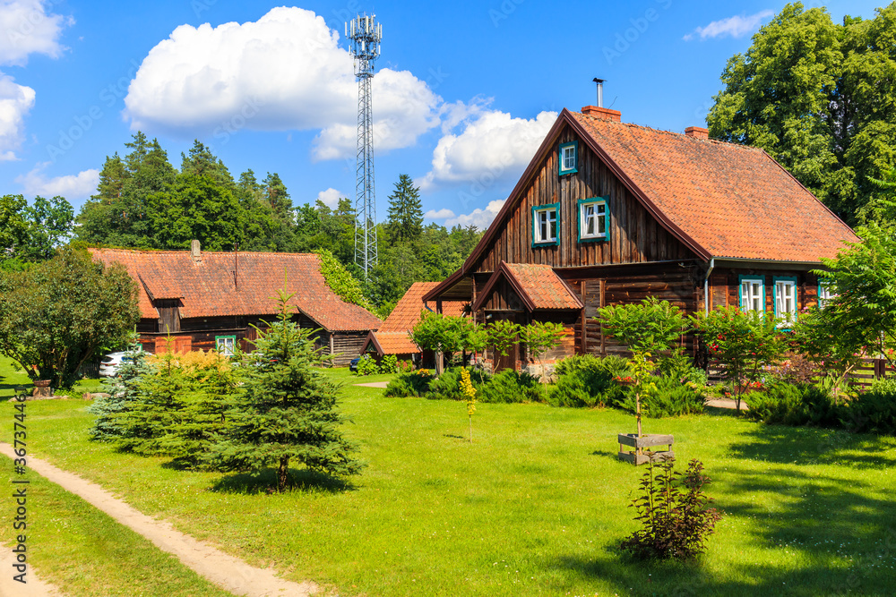 Old traditional rural houses in Krutyn village near lake Mokre, Masurian Lakes, Poland