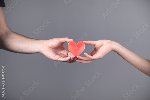 woman and man hand red heart