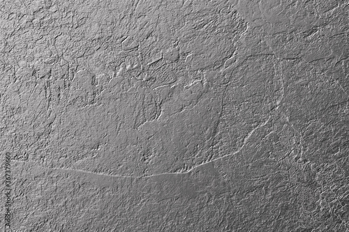 Gray grungy rock face wall surface for background, wallpaper, space for your text, copy