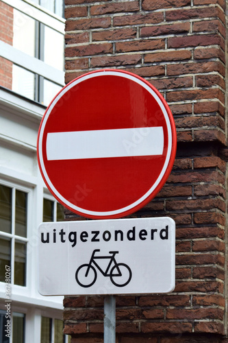 Dutch road sign: do not enter except bicycles photo