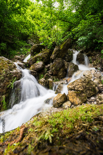 Waterfall in Cherek gorge in the Caucasus mountains in Russia