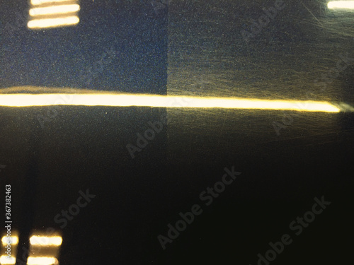 Polishing car - difference befora and after. Swirl marks and scratches and mirror glaze at polished car paint body
