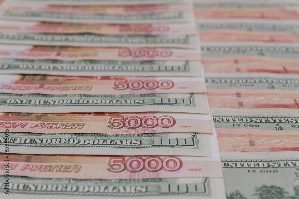 A large number of American hundred dollar bills and Russian five thousand dollar bills A large number of American hundred dollar bills and Russian five thousand dollar bills