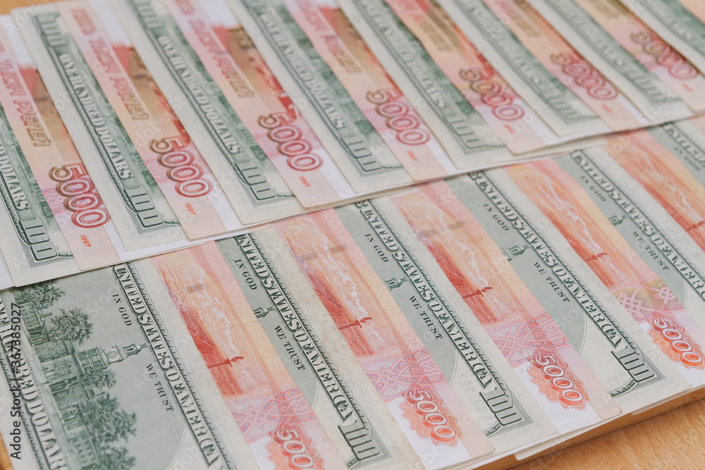 A large number of American hundred dollar bills and Russian five thousand dollar bills A large number of American hundred dollar bills and Russian five thousand dollar bills