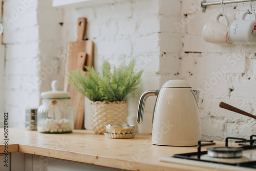 Vintage style white kitchen with kettle