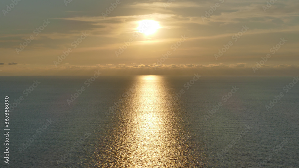 Fototapeta premium Sunset and reflections in the Cantabrian Sea, Basque Country.