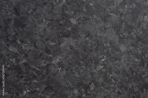 Black granite background. Dark color marble texture