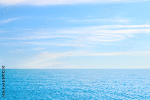 Beautiful ripply sea under blue sky with clouds