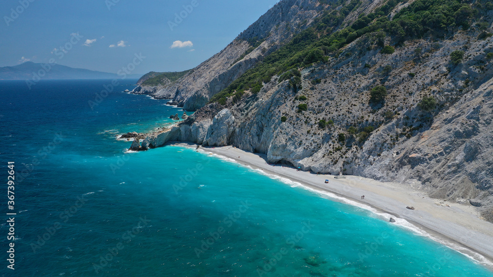 Fototapeta premium Aerial drone photo of Lalaria beach, one of the most beautiful in Greece and one that made Skiathos island famous with arch like rock formation, Sporades islands