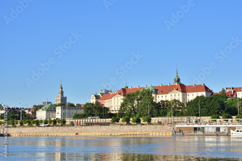 The view of the Warsaw Old Town from the other side hung on a sunny morning.