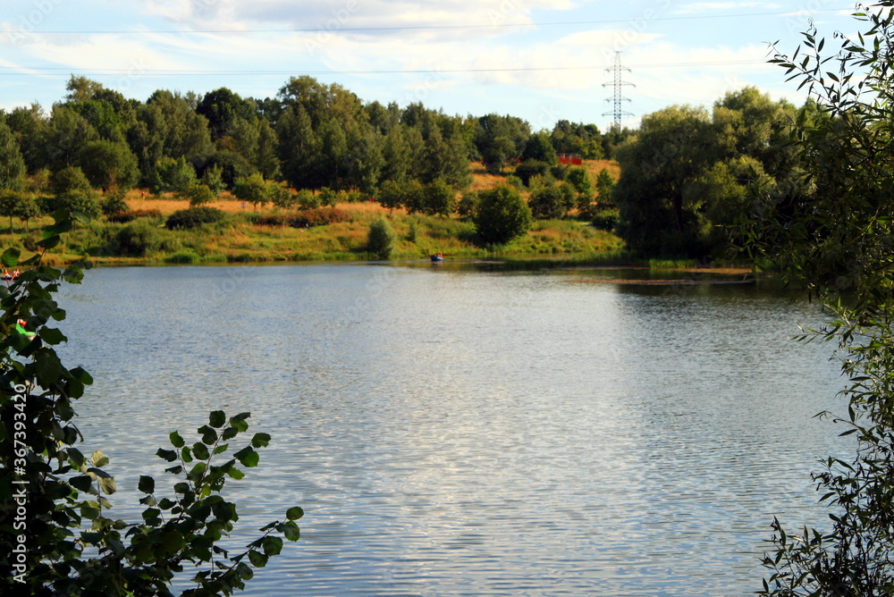 landscape of a city Park with a pond landscape of a city Park with a pond
