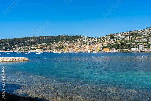 Villefranche-sur-Mer, France. 16.07.2020. Summer day on the beach. Tourism concept. Nature landscape. Card for concept design. Beach vacation.  © Elena