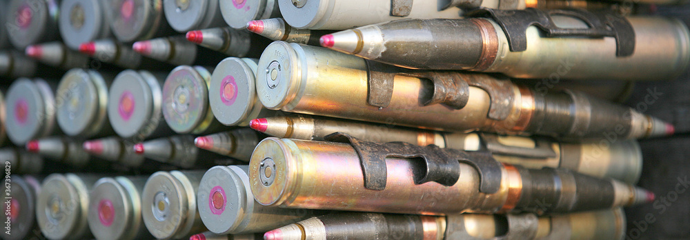 Patrons and ammunition close-up neatly and beautifully laid out, background,