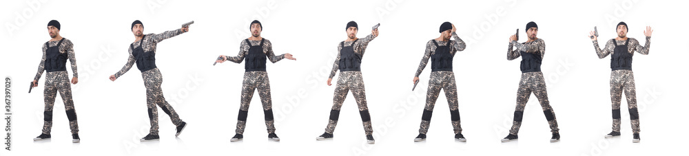 Soldier in camouflage with gun on white