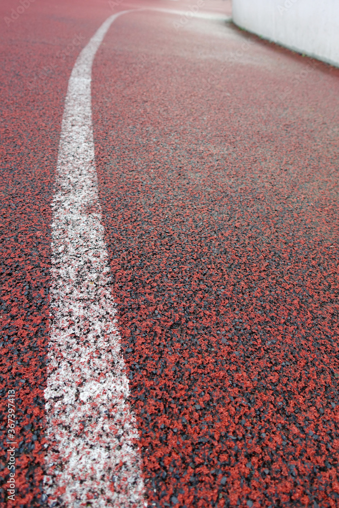 Detail of red running track