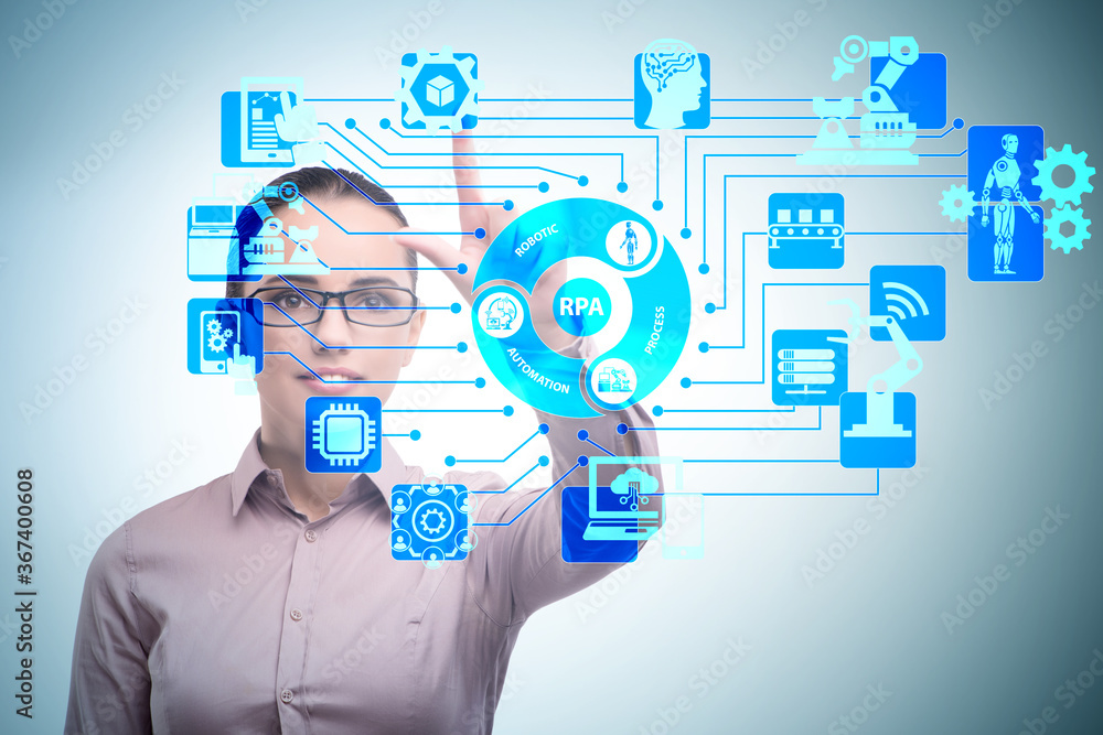 Businesswoman pressing buttons in RPA concept Businesswoman pressing buttons in RPA concept