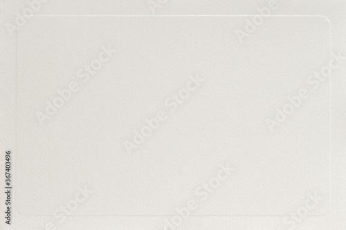 Organic light cream paper with embossed patterned border, blank for your design. Background, copy space photo