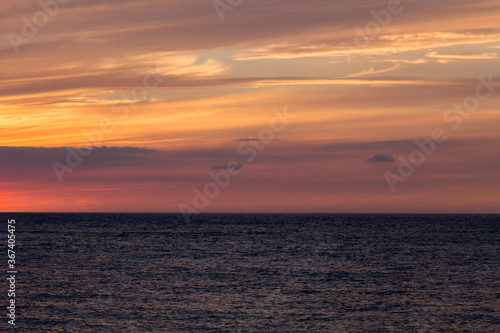 view of the horizon of beautiful sunset at sunset in the sea