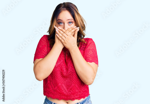 Young beautiful caucasian woman wearing casual clothes shocked covering mouth with hands for mistake. secret concept.