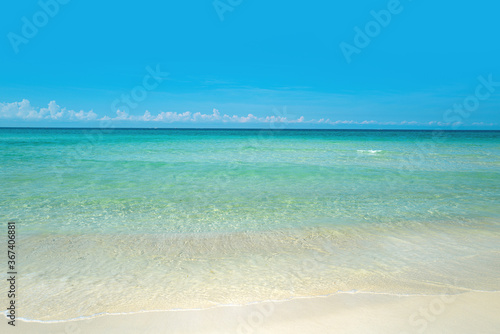 Sea beach with blue sky sand sun.
