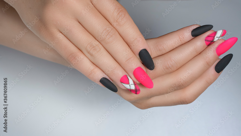 Manicure nail paint . beautiful female hand with colorful nail art design manicure Manicure nail paint . beautiful female hand with colorful nail art design manicure