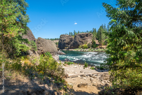 A small beach area along the Spokane River at the Bowl and Pitcher area of Riverside State Park in Spokane, Washington, USA