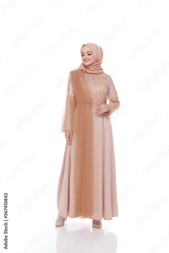 Full body portrait of lady use a wedding dress, wedding makeup on hijab. Malay or indonesia wedding dress, beauty or eidul fitri concept. Beautiful southeast asian muslim woman posing in islam dress