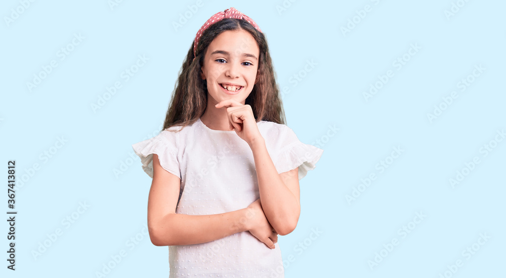 Cute hispanic child girl wearing casual white tshirt looking confident at the camera smiling with crossed arms and hand raised on chin. thinking positive. Cute hispanic child girl wearing casual white tshirt looking confident at the camera smiling with crossed arms and hand raised on chin. thinking positive.