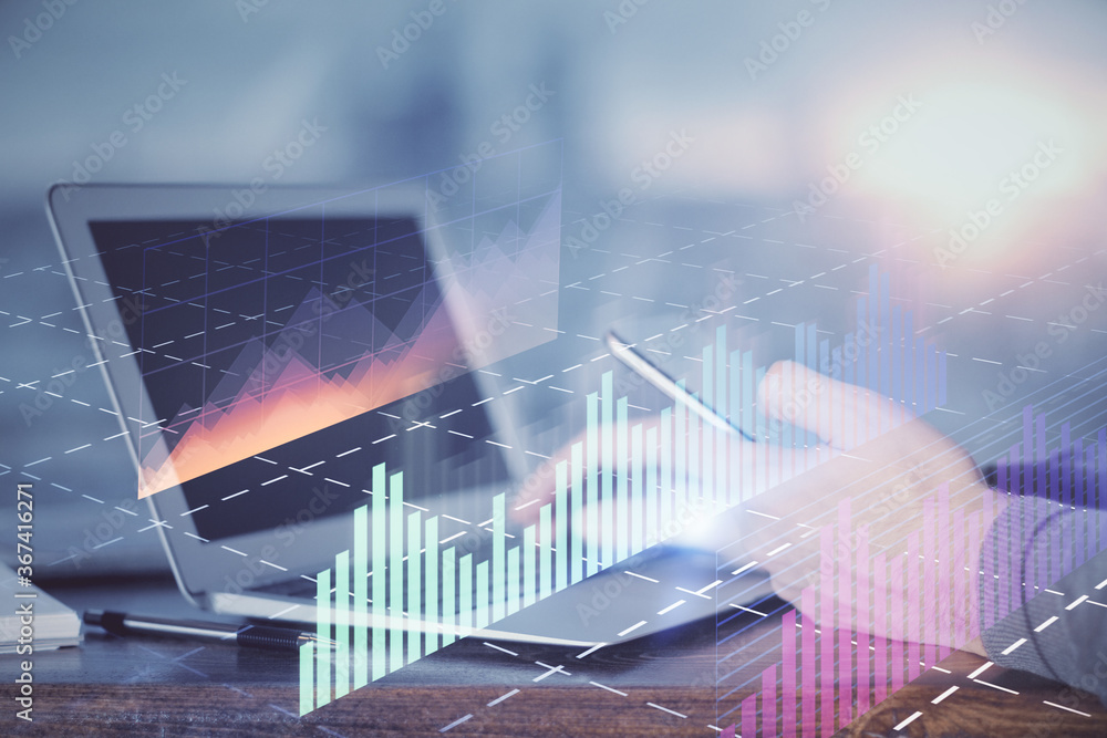 Double exposure of man's hands holding and using a digital device and forex graph drawing. Financial market concept. Double exposure of man's hands holding and using a digital device and forex graph drawing. Financial market concept.
