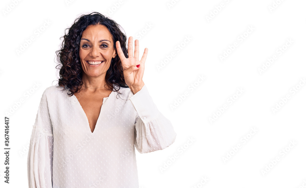 Middle age beautiful woman wearing casual sweater showing and pointing up with fingers number four while smiling confident and happy. Middle age beautiful woman wearing casual sweater showing and pointing up with fingers number four while smiling confident and happy.
