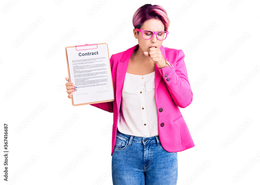 Young beautiful woman with pink hair holding clipboard with contract document feeling unwell and coughing as symptom for cold or bronchitis. health care concept. Young beautiful woman with pink hair holding clipboard with contract document feeling unwell and coughing as symptom for cold or bronchitis. health care concept.