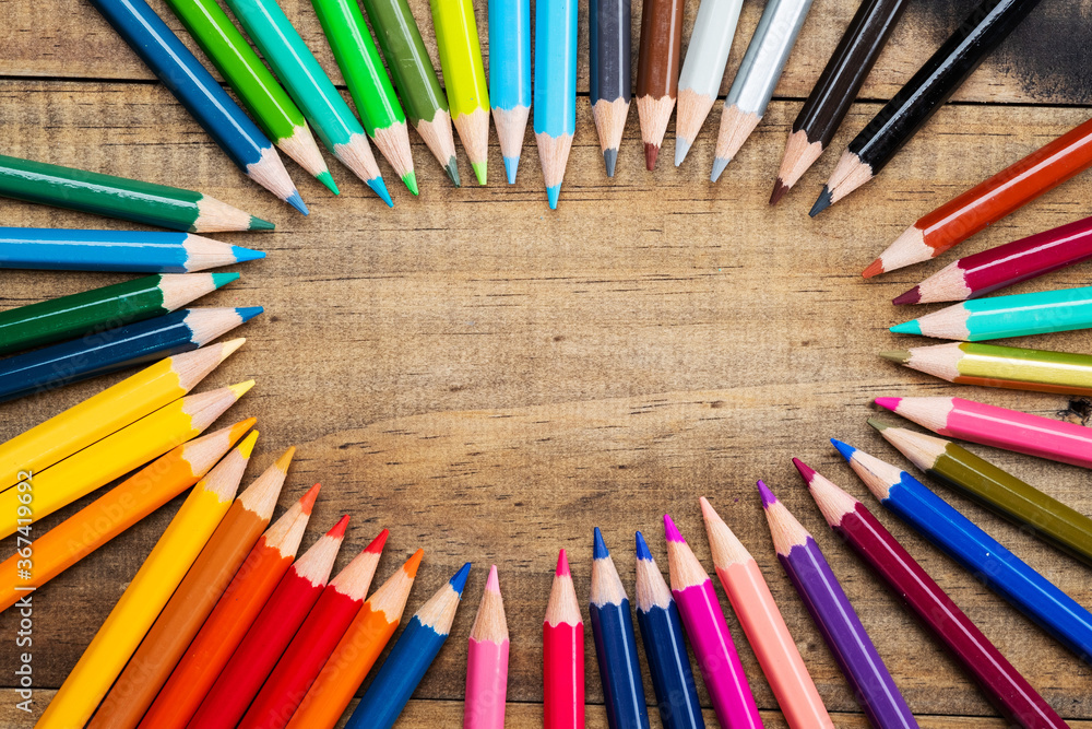 color pencil on wood background, back to school concept
color pencil on wood background, back to school concept