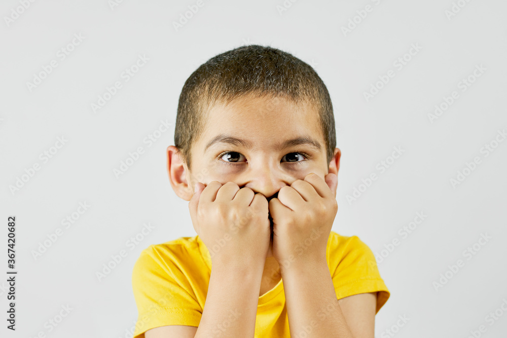 Portrait of middle eastern schoolboy looking frustrated and bored Portrait of middle eastern schoolboy looking frustrated and bored