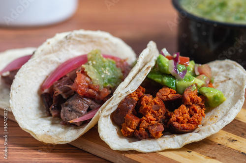 Mexican barbecue tacos of carne asada and chorizo