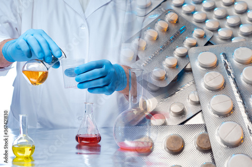 Hands of a chemist with lab...