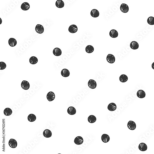 Simple seamless repeat pattern with hand-drawn scribble sketched polka dot on a white background