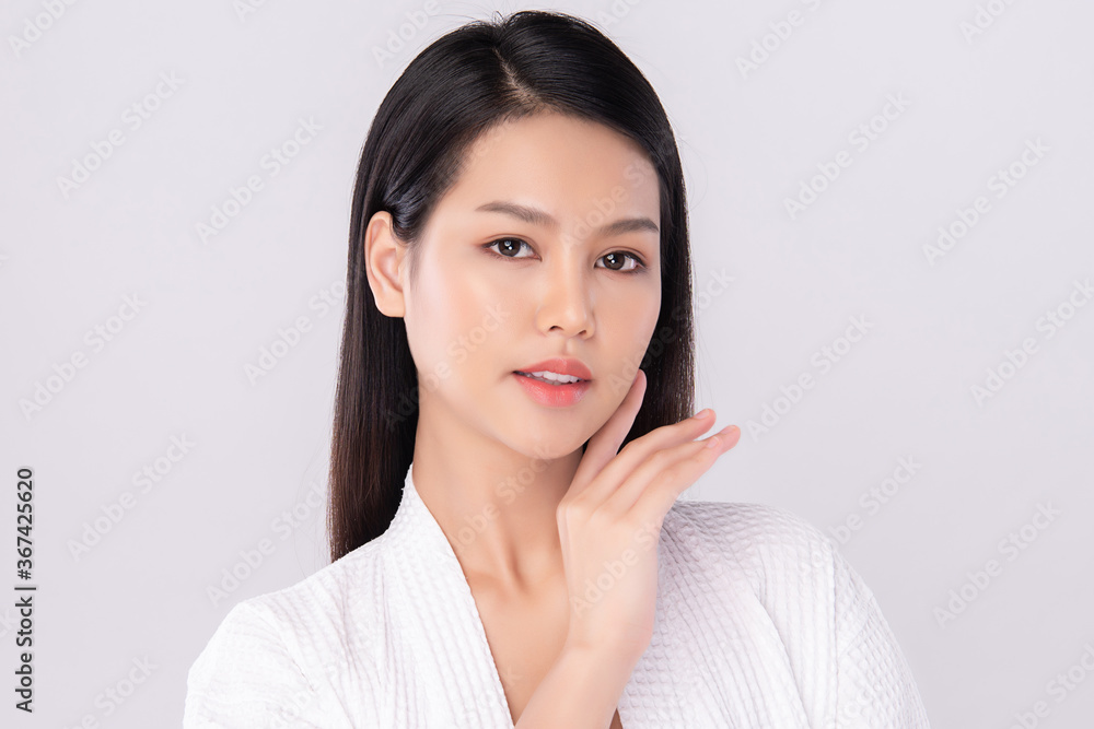 Beautiful Young asian Woman with Clean Fresh Skin, on white background, Face care, Facial treatment, Cosmetology, beauty and spa, Asian women portrait Beautiful Young asian Woman with Clean Fresh Skin, on white background, Face care, Facial treatment, Cosmetology, beauty and spa, Asian women portrait