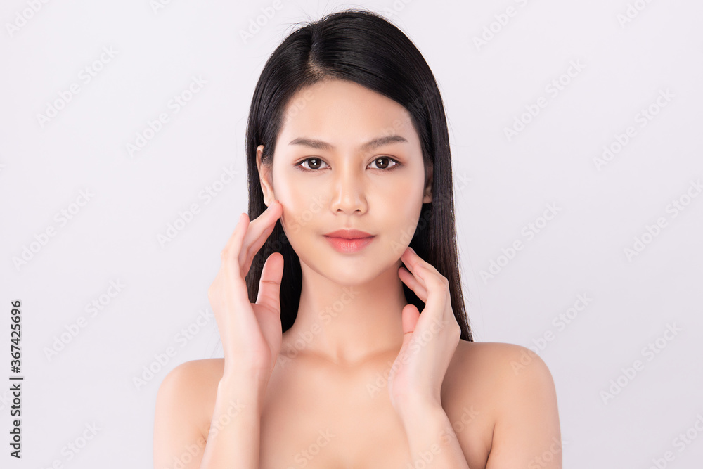 Beautiful Young asian Woman with Clean Fresh Skin, on white background, Face care, Facial treatment, Cosmetology, beauty and spa, Asian women portrait Beautiful Young asian Woman with Clean Fresh Skin, on white background, Face care, Facial treatment, Cosmetology, beauty and spa, Asian women portrait