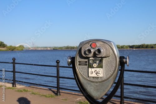 coin operated binoculars on the river photo