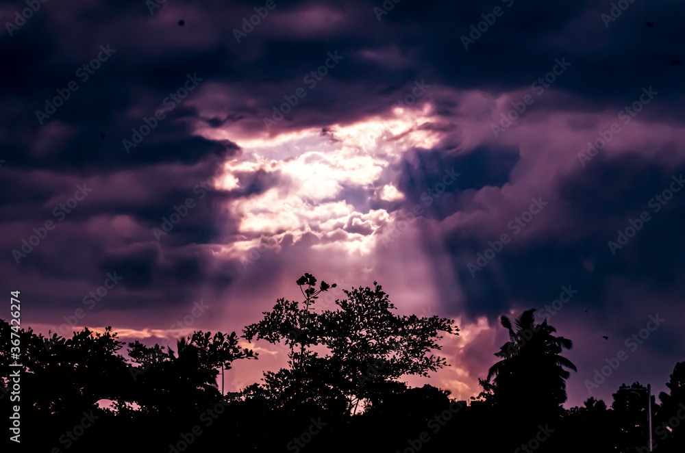 Fototapeta premium The Door Of Heaven, that is then evening when the sky covered by cloud and stop raining and sunlight shining out from gape of clouds.