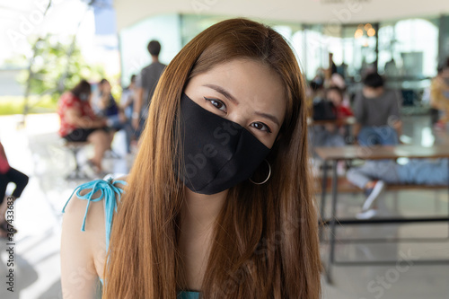 Asian woman travel wearing face protection in prevention for coronavirus.