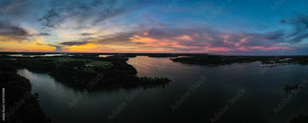 Aerial view of orange sky during sunset over Barren River lake in western Kentucky, USA