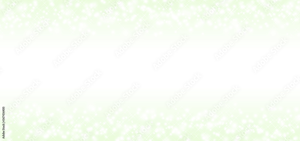 light and glitter on green background